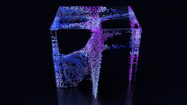 Particles swirl around inside a glass cube.
