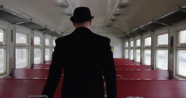 Man going in railway carriage