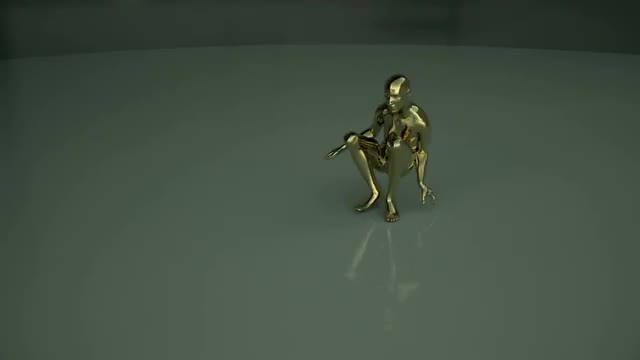 A golden human form performs a dance then deflates.