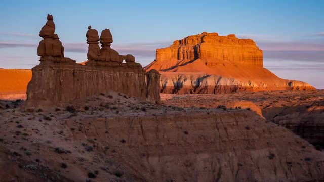 Time lapse of the sun lighting up Wild Horse Butte in Goblin Valley