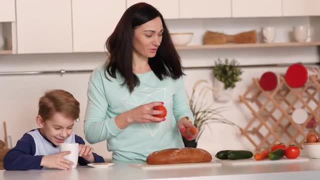 Mother and son in the kitchen