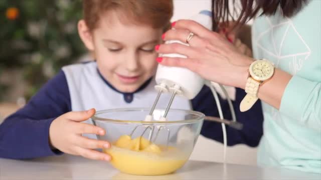 Mother and son in the kitchen