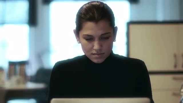 Portrait of a young businesswoman working in a modern downtown office.