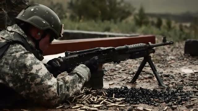Soldier shoots gun
