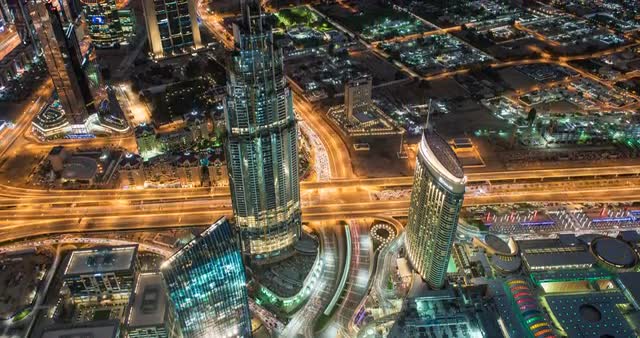 Timelapse from viewpoint at night with cityscape and traffic in view