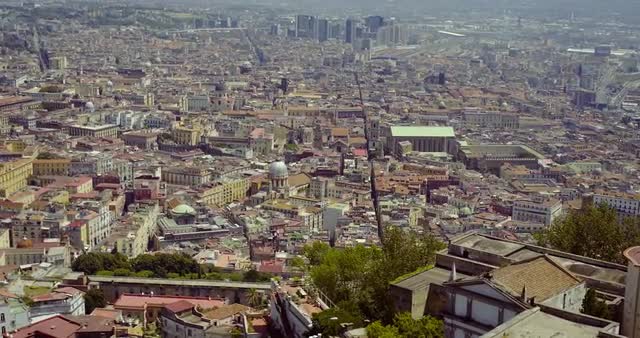 Video shot over Castel Sant Elmo on a sunny day with central Naples cityscape