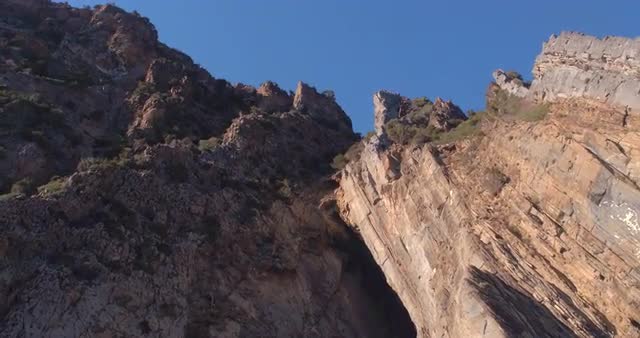 Video shot of cliffs on Porto Flava beach on a sunny day 