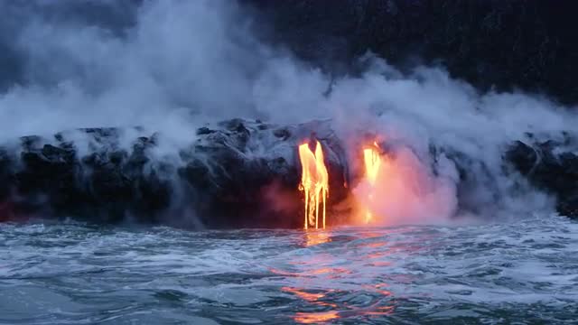 Molten Lava Streams from Hawaii's Kilauea Volcano Into the Ocean At Dawn 20