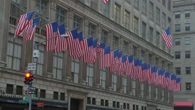 Circa February 21, 2018 - American Flags on the side Saks Fifth Avenue
