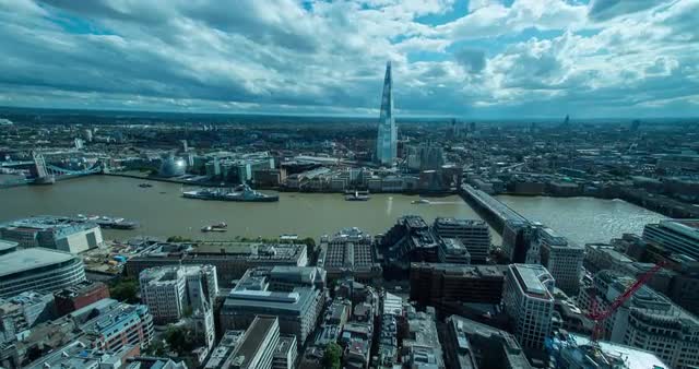 Timelapse over London cityscape on a sunny day with view of The Shard,