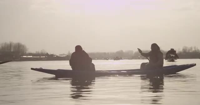 Pair Paddling on Waterway