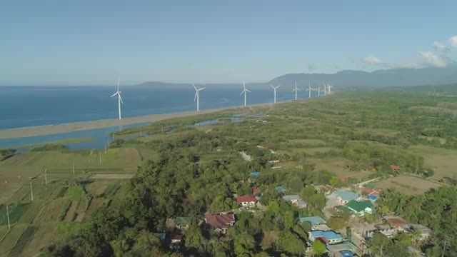 Solar Farm with Windmills. Philippines, Luzon