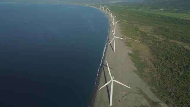 Solar Farm with Windmills. Philippines, Luzon