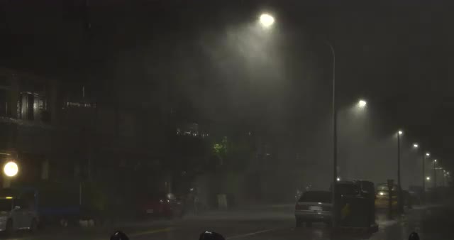 Winds And Rain Swirl Through Street As Hurricane Nears Landfall