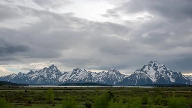 Time lapse of clouds moving over the Grand Teton Mountains