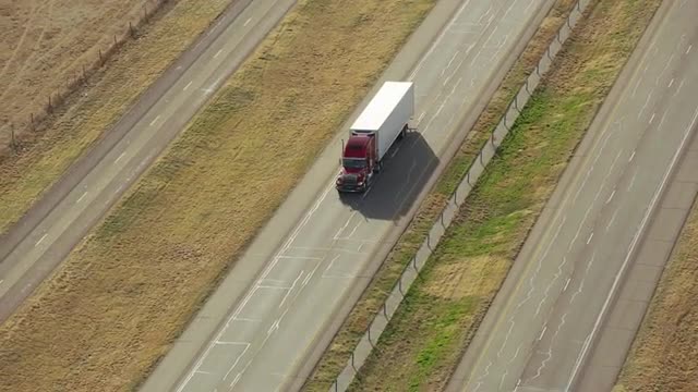 Aerial view of semi truck on highway in Texas