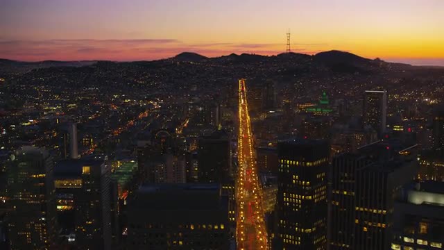 San Francisco, California circa-2017, Aerial view flying up Market Street at sunset