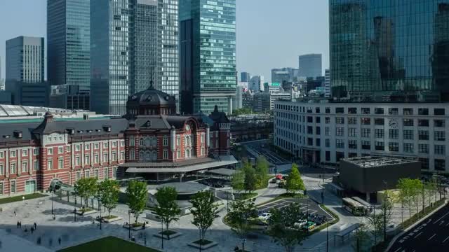 Timelapse view of traffic at Tokyo station on a sunny afternoon, Tokyo, Japan