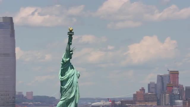 New York City, New York circa-2017, Aerial view of Statue of Liberty and Manhattan.  Shot with Cinef