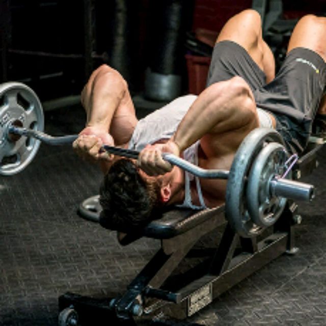 EZ Bar Skull Crushers Exercise Howto Workout Trainer by Skimble