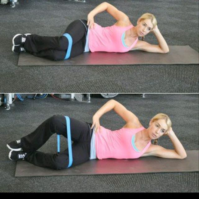 Quadruped position. Hamstring stretch prone. Lie lay exercises. Hip extension. Dreams of a girl lying on the grass stock photo.