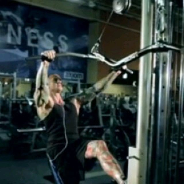 Standing Lat Pulldown Exercise Howto Workout Trainer by Skimble