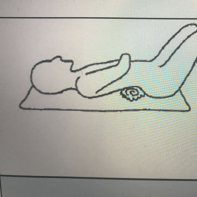 Towel under lumbar by Ade M. Exercise Howto Skimble