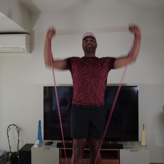 Shoulder Press (Band) by Daniel Arixi Exercise Howto Skimble