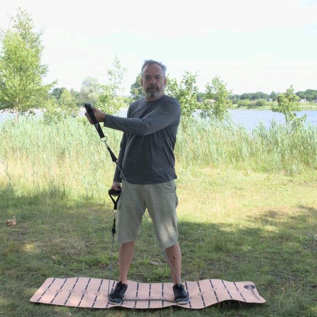 Bands Standing Chest Cross Over by Frank Roodenburg Exercise Howto Skimble