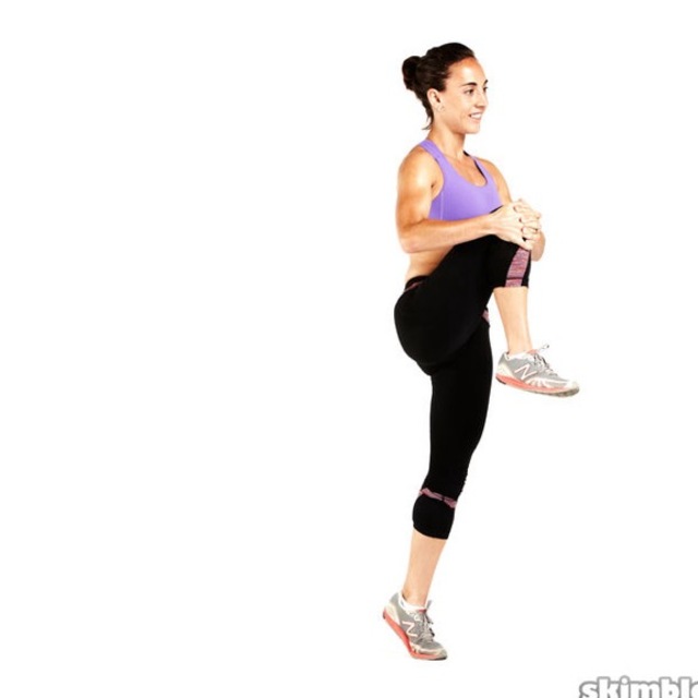 Standing Knee To Chest by Louis Rodriguez Exercise Howto Skimble