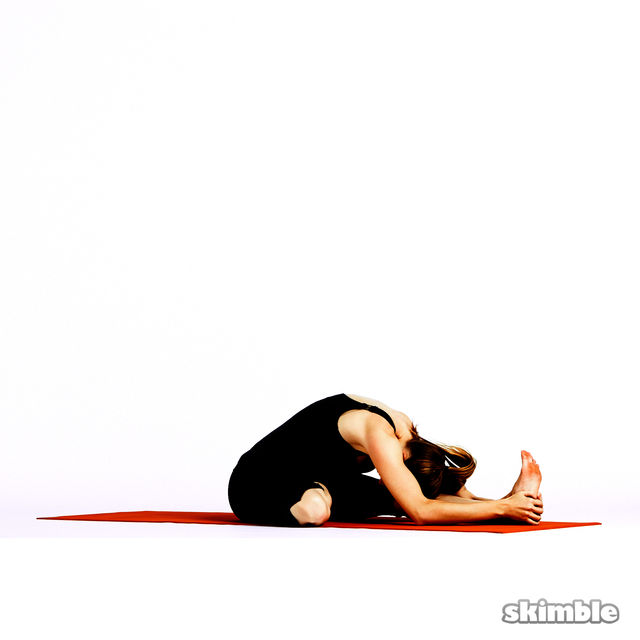 Half Lotus Forward Fold Exercise Howto Workout Trainer by Skimble