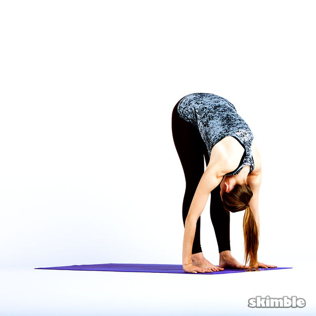 Standing Forward Bend Exercise Howto Workout Trainer by Skimble