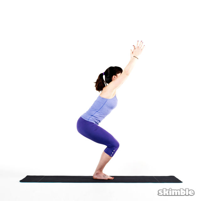 Right Twisted Chair Pose Exercise Howto Workout Trainer by Skimble