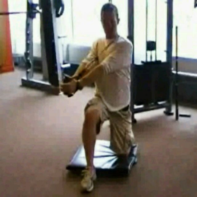 Kneeling Diagonal Chops by Silas Eisenback Exercise Howto Skimble