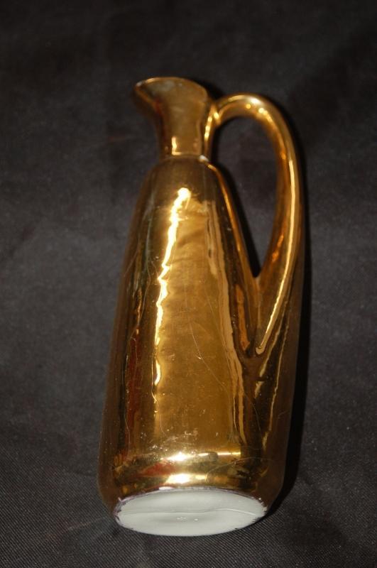 GOLD DECORATED POTTERY VASE