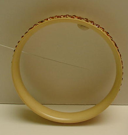 Celluloid vintage bangle with gold rhinestones