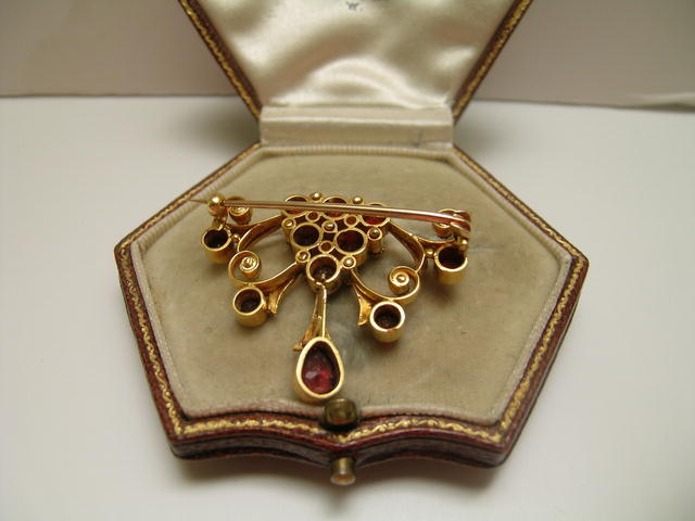 Edwardian 15 Ct. Gold and Garnet Brooch