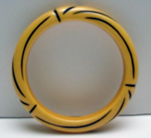 Butterscotch and Black carved bangle