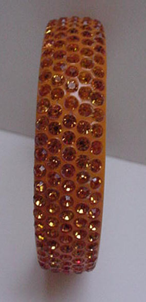 Celluloid Bangle with gold rhinestones