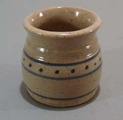 Mini blue and white stoneware pot.