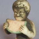 Black Boy Eating Watermelon Sitting On Alligator Porcelain Figurine - Ethnographic