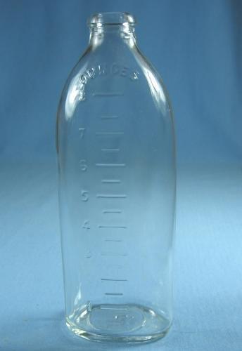 vintage MENNEN BABY Bottle - Antique Glass Baby in Sailboat Molded Glass
