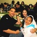 Caption: Students and staff eat a Thanksgiving dinner at Youth Radio., Credit: Youth Radio