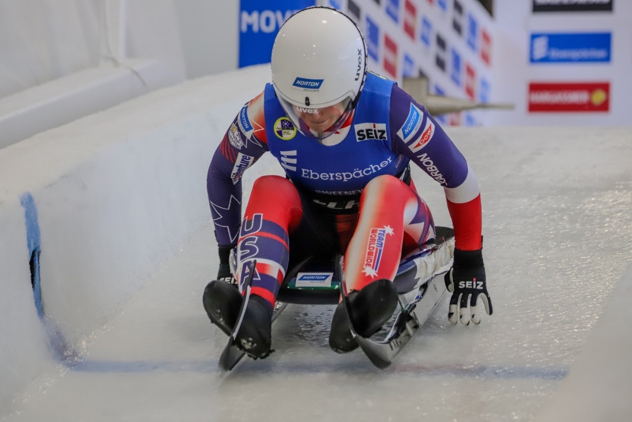 A person on a sled Description automatically generated