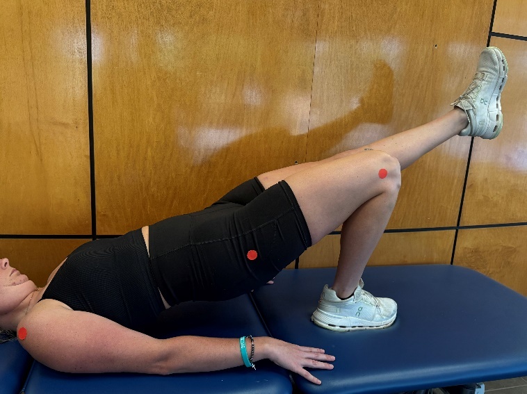 A person lying on a bench