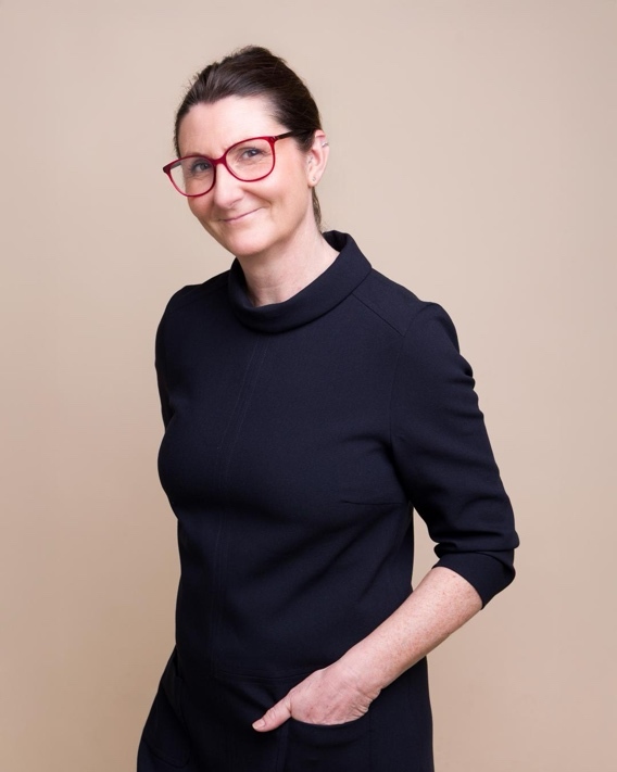 A person wearing a black shirt and red glasses AI-generated content may be incorrect.