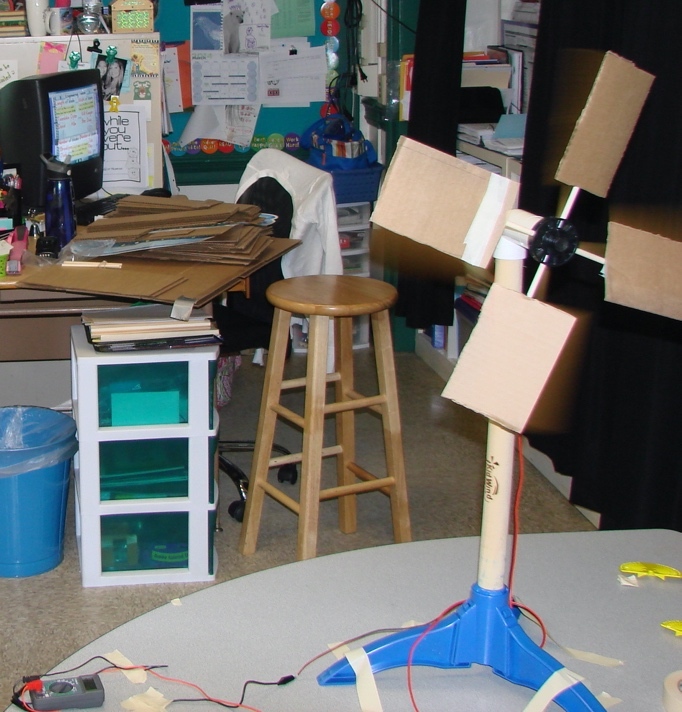 A picture containing text, indoor, cluttered Description automatically generated