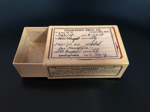 A box with a lid open Description automatically generated