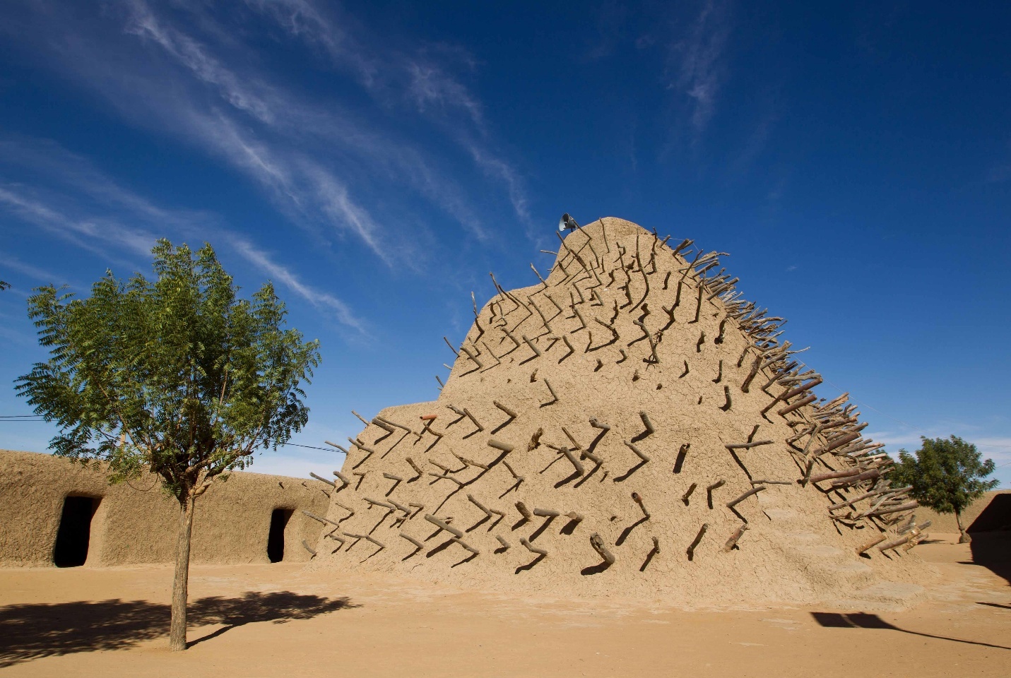 A large pyramid made of sand AI-generated content may be incorrect.