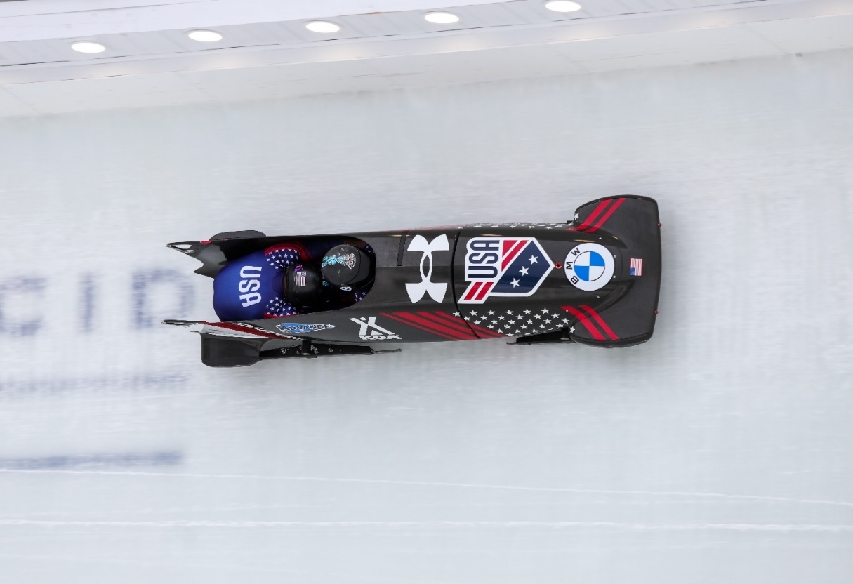 A person on a sled AI-generated content may be incorrect.